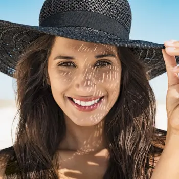 beautiful young woman in a hat