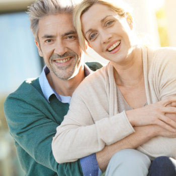 Cheerful middle aged couple