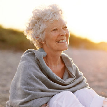 happy old lady on the beach