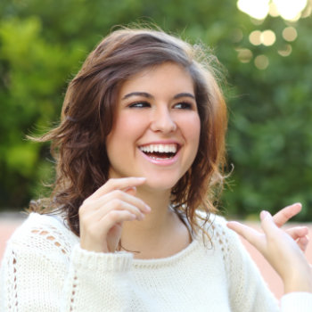 laughing brunette with a beautiful smile