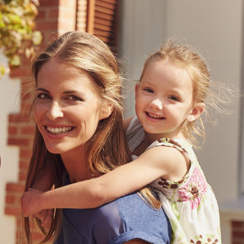 laughing mother with daughter