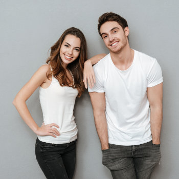 young laughing couple with beautiful smiles