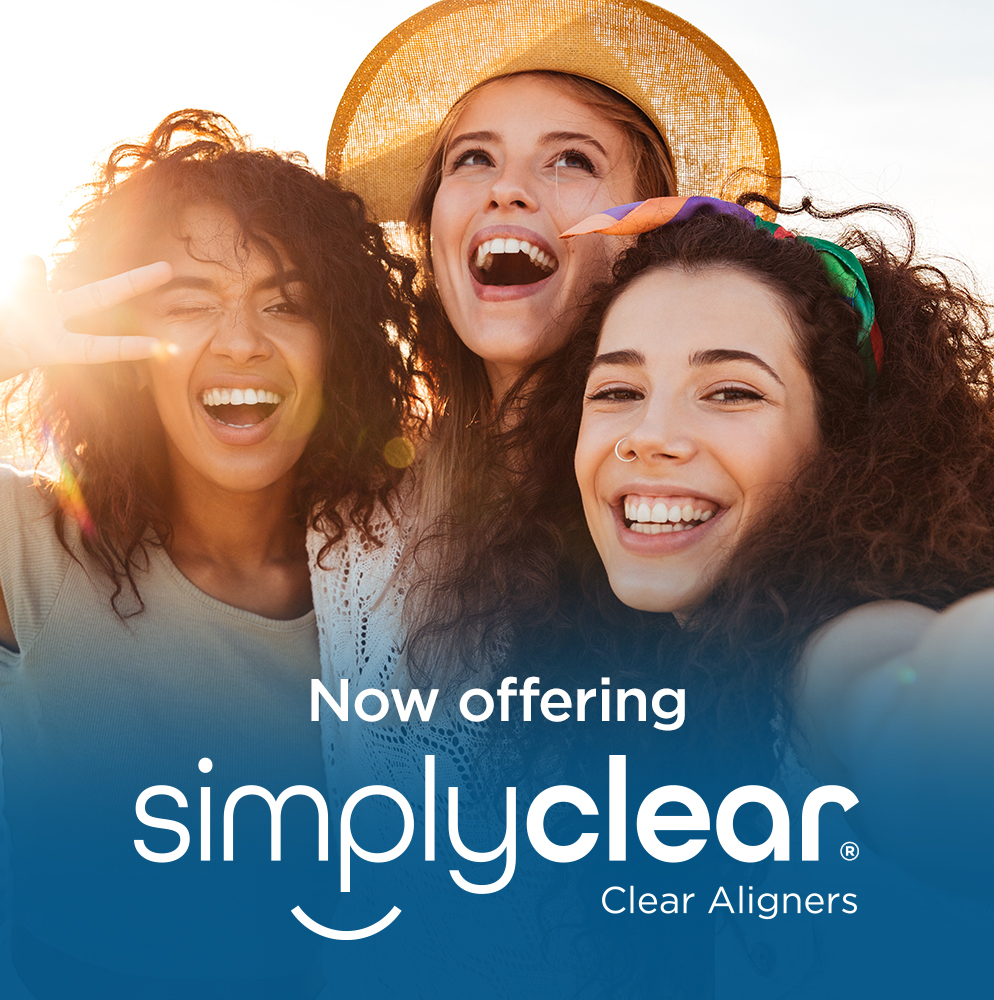 Three women smiling and posing for a selfie outdoors. Text overlay reads, "Now offering simply clear Clear Aligners.